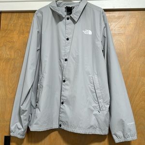 Grey north face coach jacket